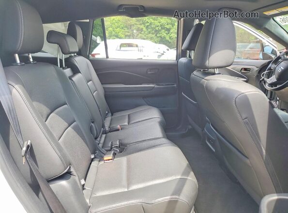 5FNYF8H57RB018459 2024 HONDA PASSPORT White Rear interior view