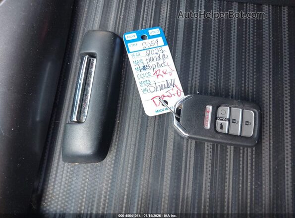 5FNYF8H58PB036093 2023 HONDA PASSPORT Красный Вид панели приборов