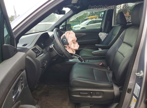 5FNYF8H59LB014906 2020 HONDA PASSPORT Silver Front interior view