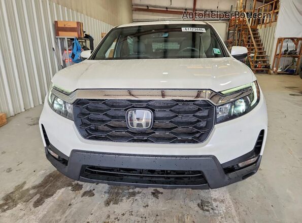 5FNYF8H59PB039312 2023 HONDA PASSPORT Белый Вид спереди