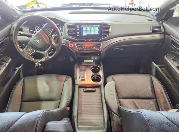 5FNYF8H59PB039312 2023 HONDA PASSPORT Белый Вид панели приборов