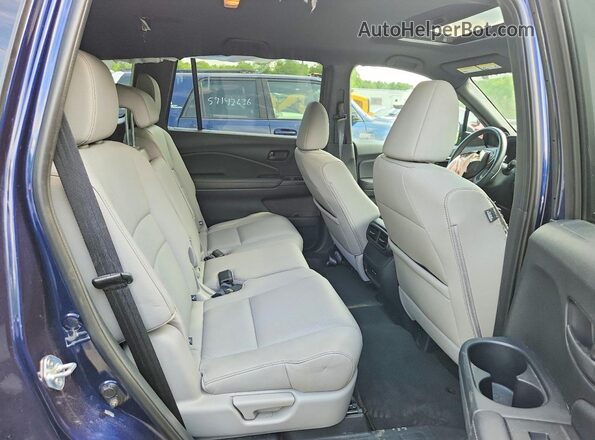 5FNYF8H59RB013375 2024 HONDA PASSPORT Blue Vista interior trasera