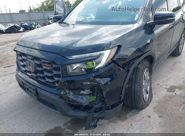 5FNYF8H61PB007138 2023 HONDA PASSPORT Black Front view