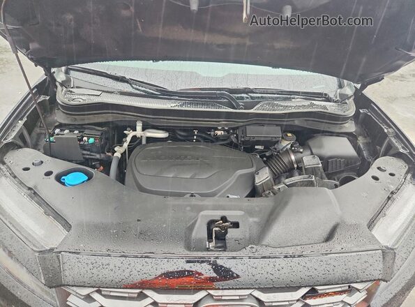 5FNYF8H62PB005236 2023 HONDA PASSPORT Black Vista del compartimento del motor
