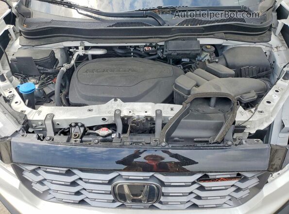 5FNYF8H64PB019364 2023 HONDA PASSPORT White Vista del compartimento del motor