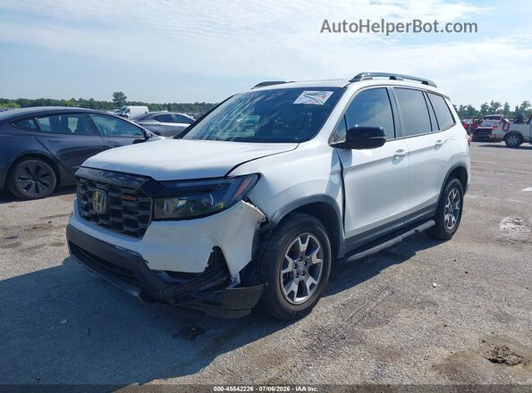 5FNYF8H68PB002907 2023 HONDA PASSPORT Белый Передняя левая четверть