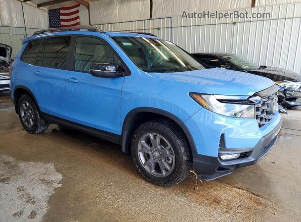 5FNYF8H69RB021274 2024 HONDA PASSPORT Blue Front right
