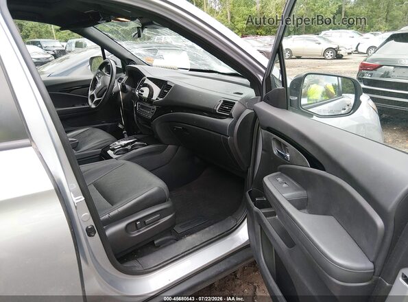 5FNYF8H90MB016936 2021 HONDA PASSPORT Silver Vista interior delantera