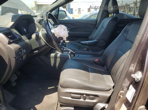 5FNYF8H91MB041313 2021 HONDA PASSPORT Gray Widok wnętrza z przodu