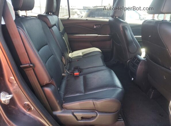 5FNYF8H91MB041313 2021 HONDA PASSPORT Gray Widok wnętrza z tyłu
