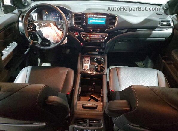 5FNYF8H91PB503065 2023 HONDA PASSPORT Белый Вид панели приборов