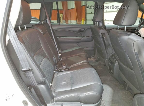 5FNYF8H91PB503065 2023 HONDA PASSPORT Белый Вид задней части салона