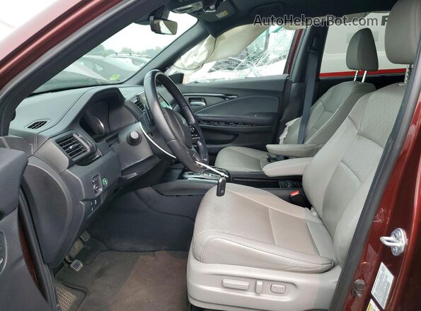 5FNYF8H99MB013405 2021 HONDA PASSPORT Maroon Vista interior delantera