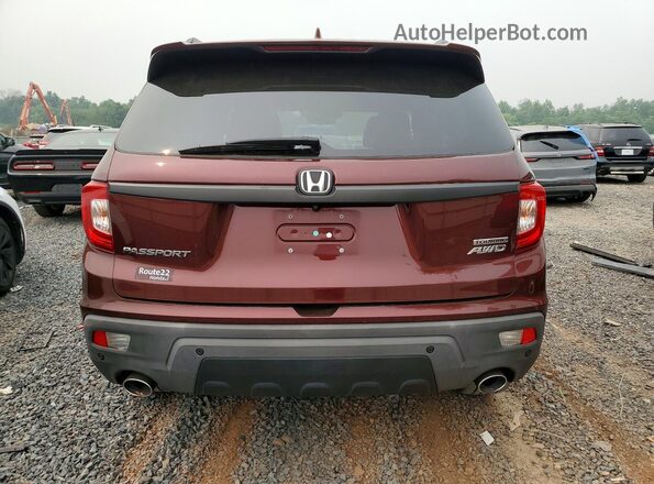5FNYF8H99MB013405 2021 HONDA PASSPORT Maroon Vista trasera