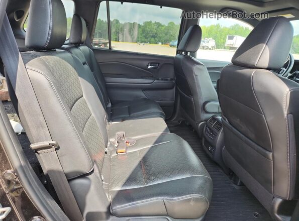 5FNYF8H9XKB019484 2019 HONDA PASSPORT Черный Вид задней части салона