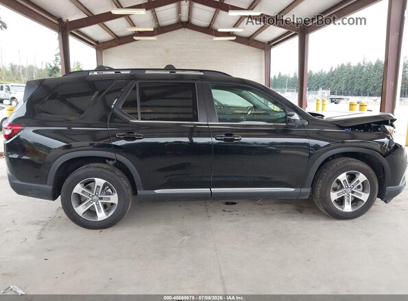 5FNYG1H5XPB057211 2023 HONDA PILOT Black Rear interior view
