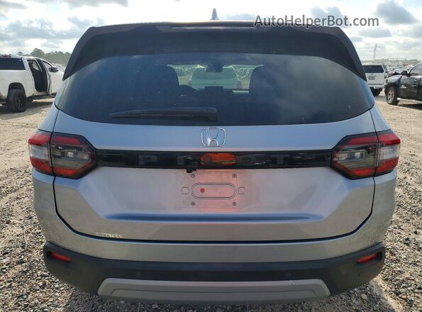 5FNYG2H42PB016410 2023 HONDA PILOT Silver Rear view