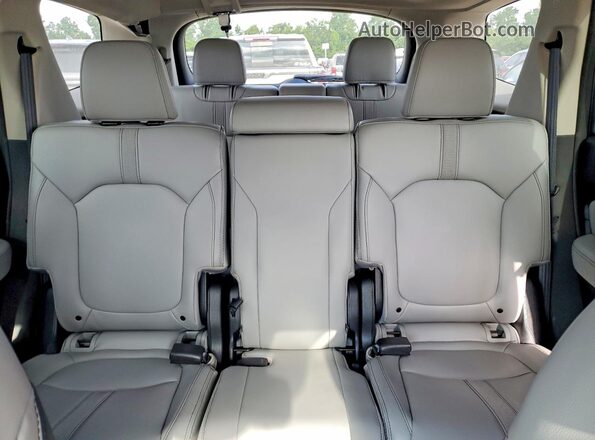 5FNYG2H42PB016410 2023 HONDA PILOT Silver Rear seats view
