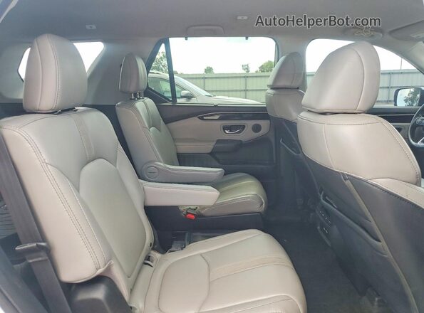 5FNYG2H58PB008868 2023 HONDA PILOT White Widok wnętrza z tyłu