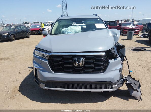 5FNYG2H75RB014311 2024 HONDA PILOT Blue Widok wnętrza z tyłu