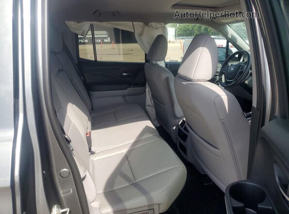 5FPYK2F62KB004230 2019 HONDA RIDGELINE Silver Հետևի նստատեղերի տեսք