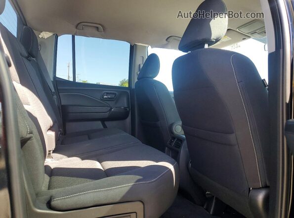 5FPYK3F14PB061191 2023 HONDA RIDGELINE Black Rear seats view