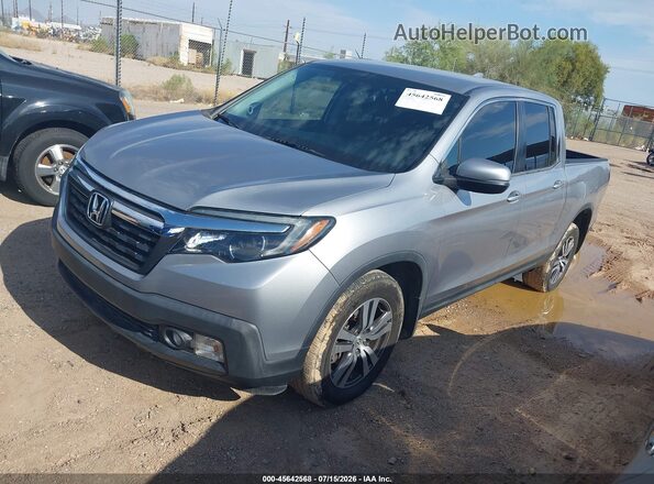 5FPYK3F45HB033928 2017 HONDA RIDGELINE Silver Vista tres cuartos delantera izquierda