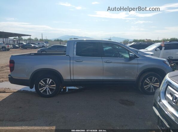 5FPYK3F45HB033928 2017 HONDA RIDGELINE Silver Vista interior trasera