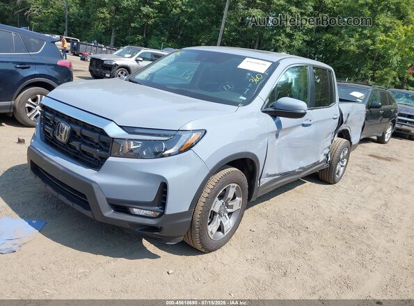 5FPYK3F57TB027680 2026 HONDA RIDGELINE Light Blue Vista tres cuartos delantera izquierda