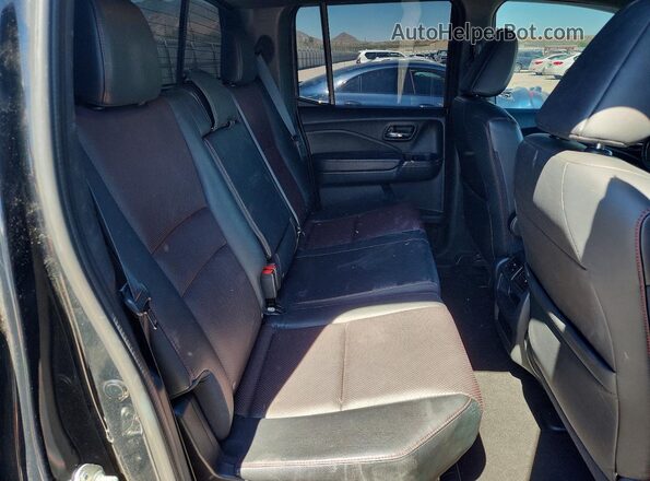 5FPYK3F83JB011693 2018 HONDA RIDGELINE Black Vista de los asientos traseros