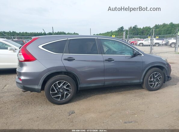 5J6RM4H42GL093083 2016 HONDA CR-V Gray Rear interior view