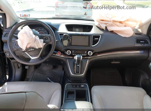 5J6RM4H73GL048597 2016 HONDA CR-V Blue Front interior view