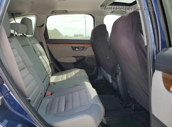5J6RW1H56KA028100 2019 HONDA CR-V Blue Vista interior trasera