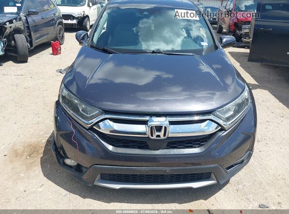 5J6RW1H59JL011620 2018 HONDA CR-V Black Rear interior view