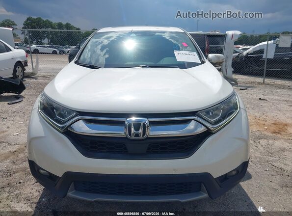5J6RW1H85JL000950 2018 HONDA CR-V White Widok wnętrza z tyłu