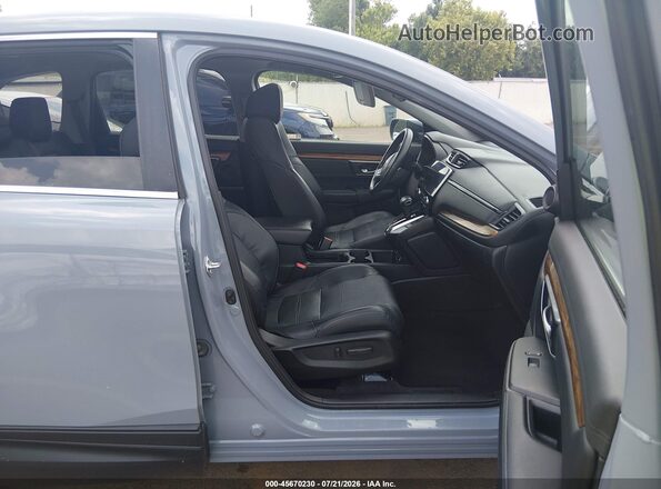 5J6RW1H87MA001050 2021 HONDA CR-V Light Blue Widok wnętrza z przodu