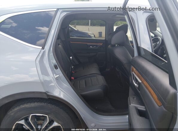 5J6RW1H87MA001050 2021 HONDA CR-V Light Blue Widok naklejki z numerem VIN