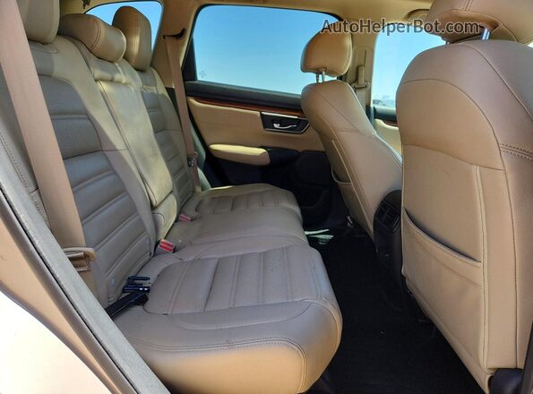 5J6RW2H59HL040700 2017 HONDA CR-V Tan Widok wnętrza z tyłu