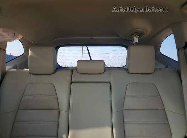 5J6RW2H80JL001638 2018 HONDA CR-V Tan Vista de los asientos traseros