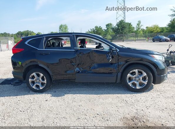 5J6RW2H82KL033802 2019 HONDA CR-V Black Widok wnętrza z tyłu