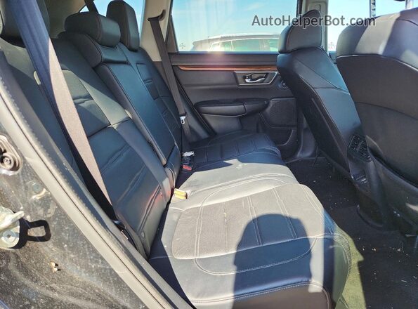 5J6RW2H84HL037648 2017 HONDA CR-V Black Rear seats view