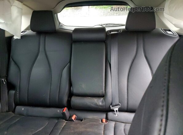 5J8TC2H39KL010057 2019 ACURA RDX Silver Vista de los asientos traseros