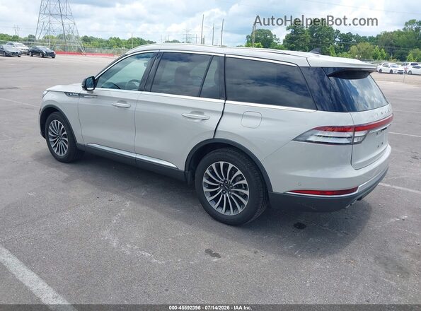5LM5J7WC3PGL00977 2023 LINCOLN AVIATOR Cream Trasero izquierdo