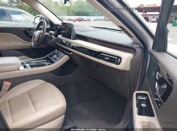 5LM5J7WC3PGL00977 2023 LINCOLN AVIATOR Cream Vista interior delantera