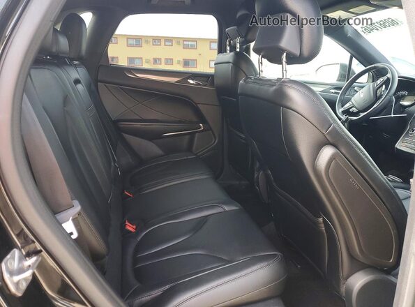 5LMCJ1C90GUJ04476 2016 LINCOLN MKC Black Widok tylnych siedzeń