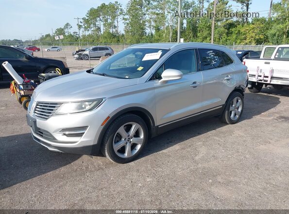 5LMCJ1C90GUJ31967 2016 LINCOLN MKC Silver Vista tres cuartos delantera izquierda