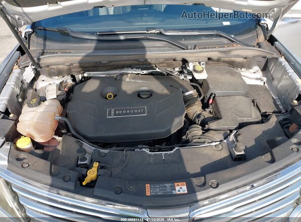 5LMCJ1C90GUJ31967 2016 LINCOLN MKC Silver Vista trasera