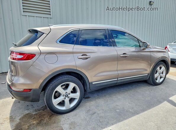 5LMCJ1C92JUL01706 2018 LINCOLN MKC Tan Հետևի աջ