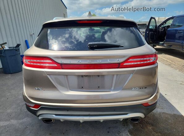 5LMCJ1C92JUL01706 2018 LINCOLN MKC Tan Հետևի տեսք
