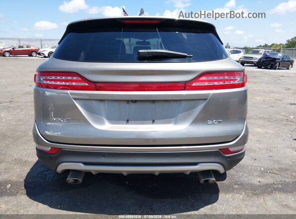 5LMCJ1C94HUL52084 2017 LINCOLN MKC Beige 